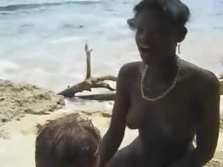 Hairy African lady fuck Euro lassie in the Beach